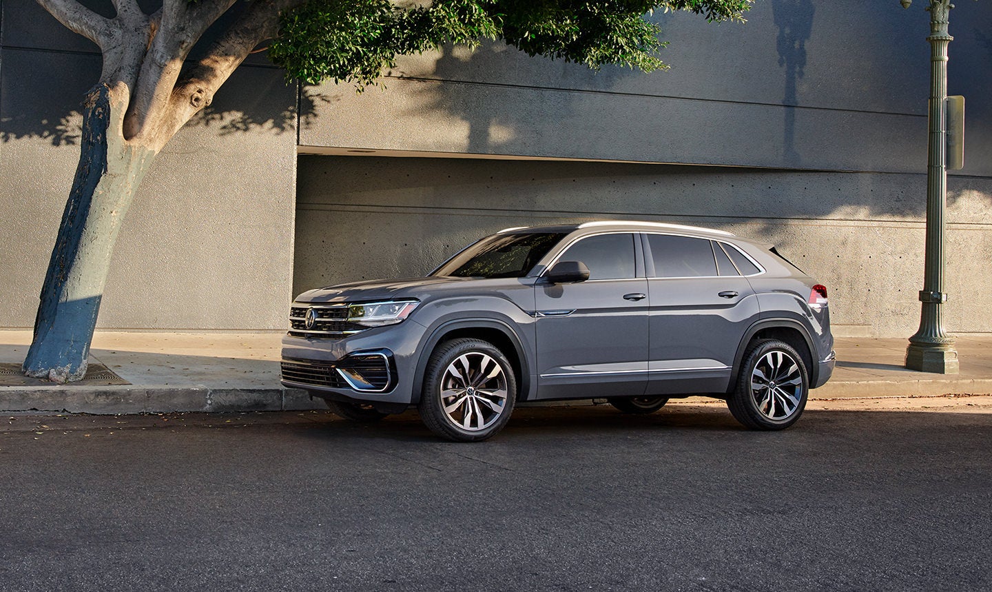 A silver 2022 Volkswagen Atlas Cross Sport parked in the Peoria area.