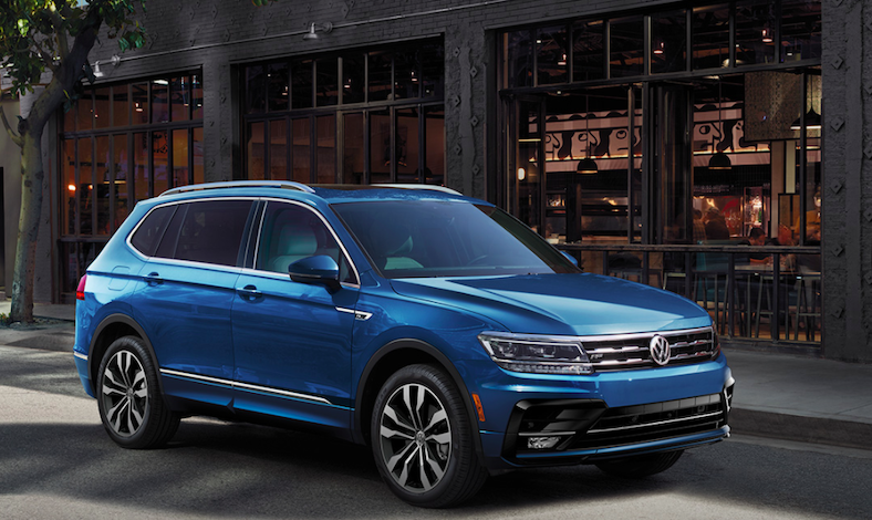 Blue Volkswagen Tiguan parked on road