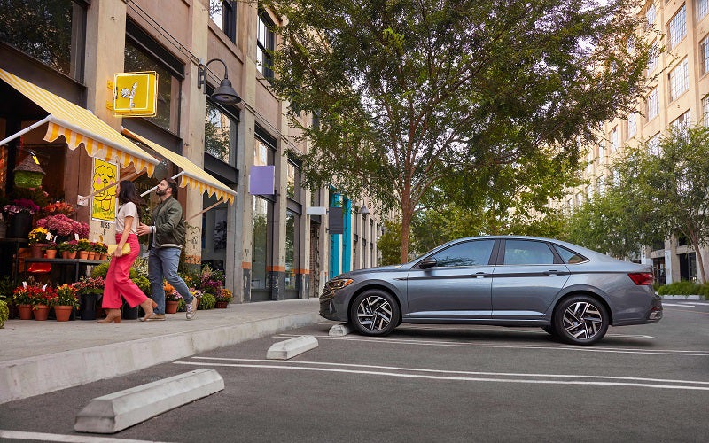 Volkswagen Jetta sedan driving in Peoria AZ